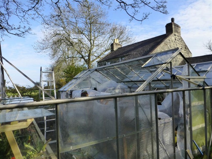 Yes half a greenhouse will stand up on its own.